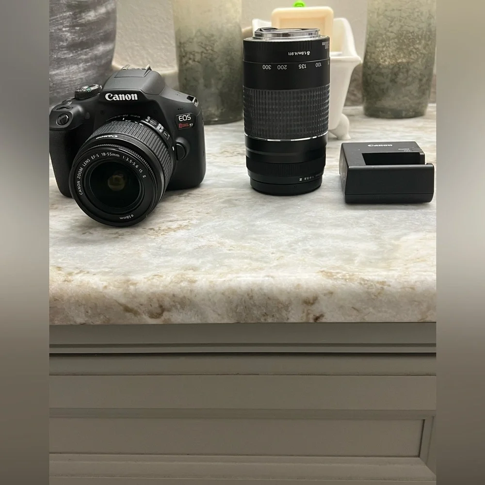 Canon Black DSLR Camera with Two Lenses and Charger